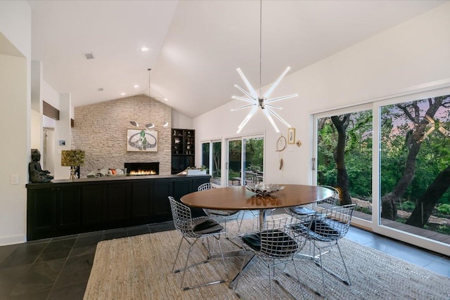 1213 Falcon Ledge Dr, Austin, TX 78746 - tiled dining area with high vaulted ceiling and a large fireplace