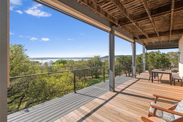 deck featuring a water view