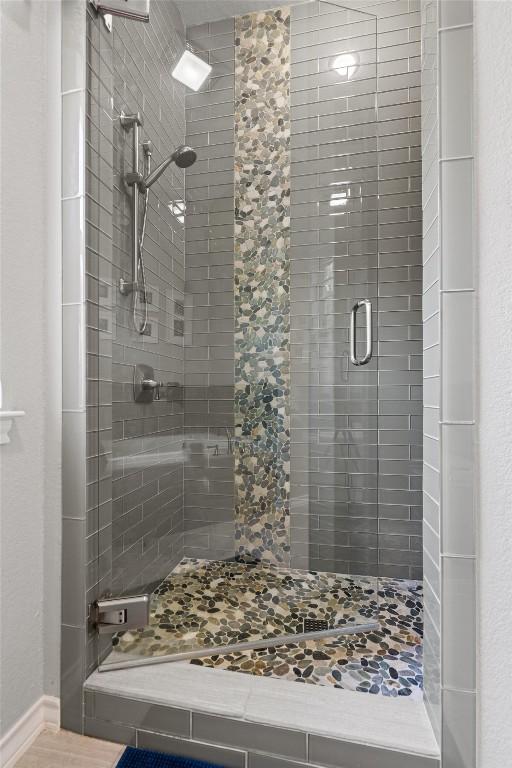 bathroom featuring a stall shower