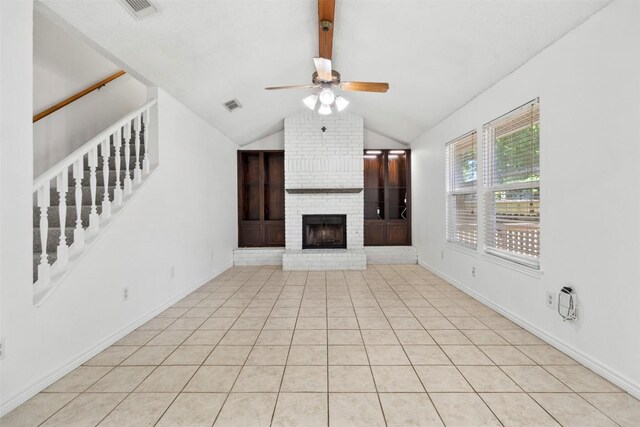 2210 Lasso Dr, Round Rock, TX 78681 - unfurnished living room with visible vents, a ceiling fan, baseboards, lofted ceiling with beams, and a brick fireplace