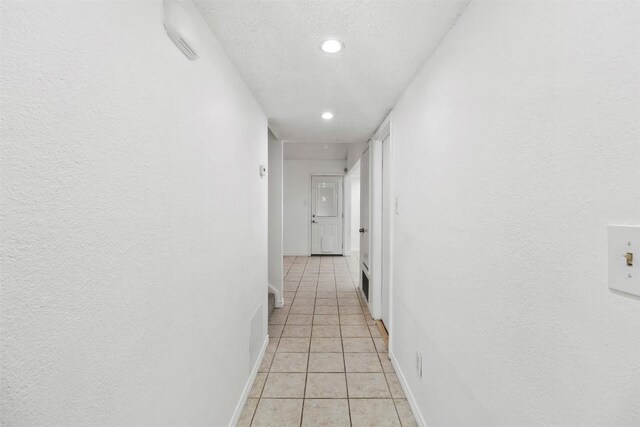 2210 Lasso Dr, Round Rock, TX 78681 - hall with light tile patterned flooring, baseboards, and recessed lighting