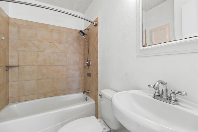 2210 Lasso Dr, Round Rock, TX 78681 - bathroom with shower / bath combination, toilet, and a sink