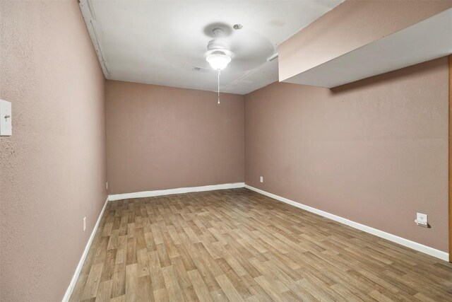 2210 Lasso Dr, Round Rock, TX 78681 - unfurnished room featuring wood finished floors and baseboards