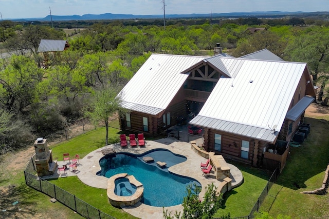 birds eye view of property with a forest view