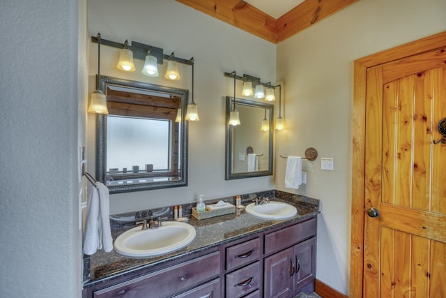 full bath with a sink and double vanity