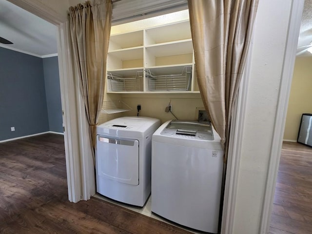 6600 Valleyside Rd Unit 24, Austin, TX 78731 - laundry room featuring independent washer and dryer, dark wood finished floors, and crown molding