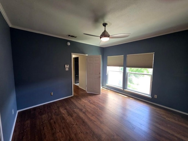 6600 Valleyside Rd Unit 24, Austin, TX 78731 - spare room featuring wood finished floors, a ceiling fan, and ornamental molding