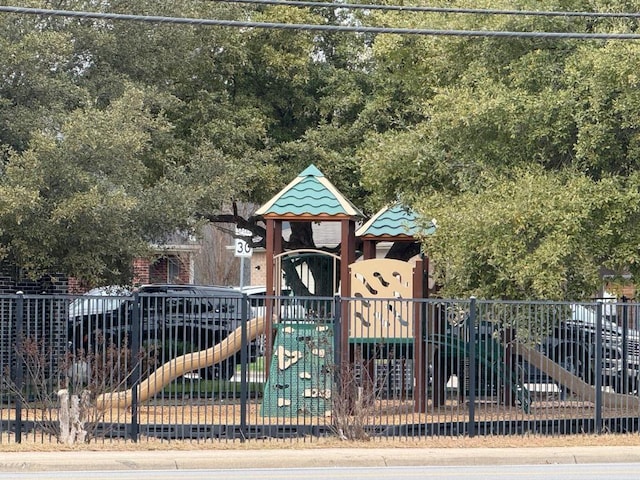 community jungle gym with fence