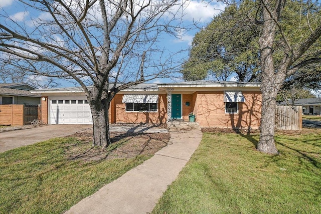 ranch-style home with driveway, an attached garage, fence, a front yard, and brick siding