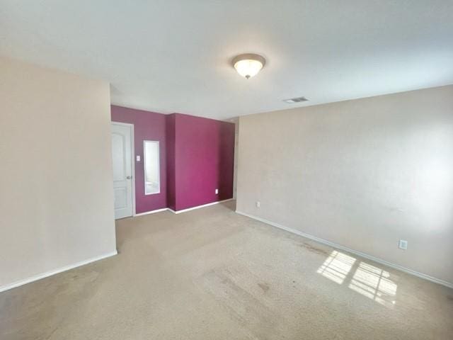 903 Grand Teton Trl, Taylor, TX 76574 - spare room with carpet floors and baseboards
