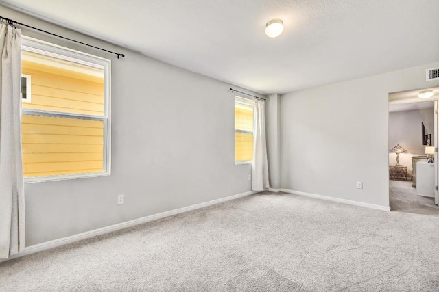 184 Martha Ln, Kyle, TX 78640 - unfurnished room featuring carpet and baseboards