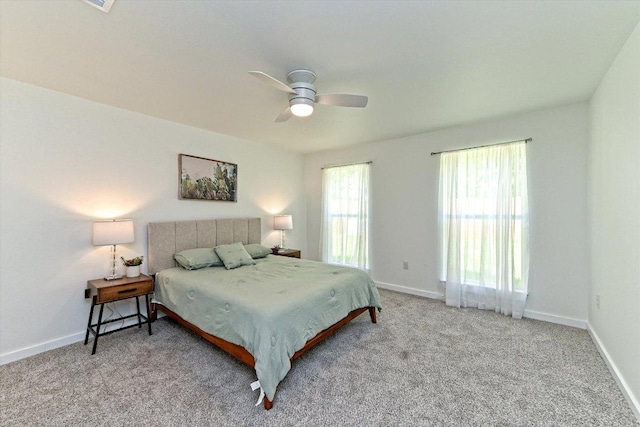 6300 Merriwood Dr, Austin, TX 78745 - carpeted bedroom with a ceiling fan and baseboards