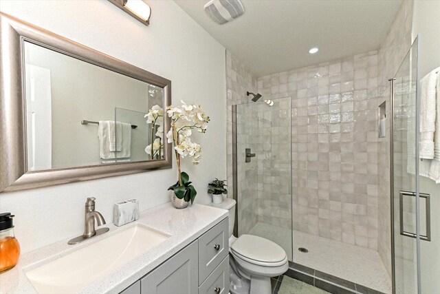 6300 Merriwood Dr, Austin, TX 78745 - full bathroom with vanity, a stall shower, and recessed lighting