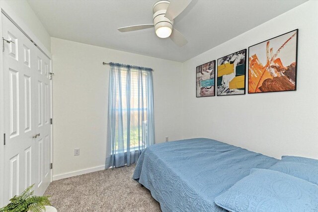 6300 Merriwood Dr, Austin, TX 78745 - bedroom with light carpet and ceiling fan