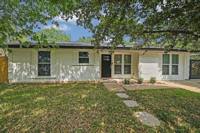 6300 Merriwood Dr, Austin, TX 78745 - view of front facade featuring brick siding