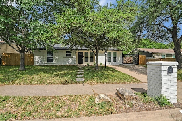 6300 Merriwood Dr, Austin, TX 78745 - view of front of property with concrete driveway
