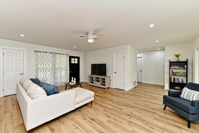 6300 Merriwood Dr, Austin, TX 78745 - living area with light wood finished floors, recessed lighting, and ceiling fan