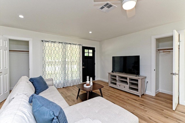 6300 Merriwood Dr, Austin, TX 78745 - living area featuring wood finished floors, ceiling fan, and recessed lighting