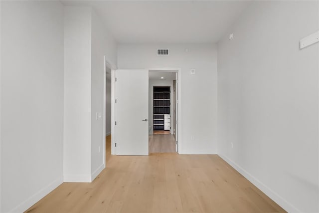 44 E Ave Unit 3107, Austin, TX 78701 - empty room featuring light wood-style floors and baseboards