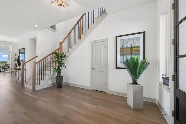 298 Smoke Tree Cir, Dripping Springs, TX 78620 - entryway with wood finished floors, stairway, and recessed lighting