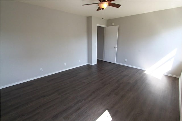 122 Bayliss St, Hutto, TX 78634 - spare room featuring ceiling fan, baseboards, and dark wood-type flooring