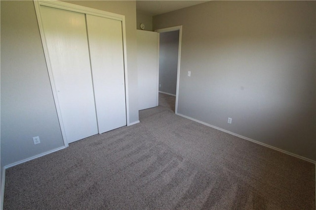 122 Bayliss St, Hutto, TX 78634 - unfurnished bedroom with carpet floors, a closet, and baseboards