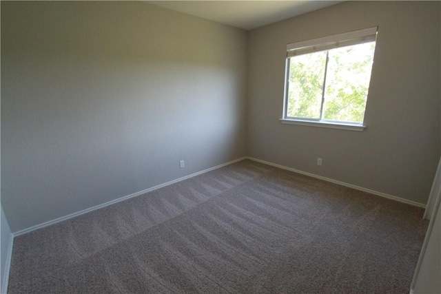 122 Bayliss St, Hutto, TX 78634 - carpeted spare room featuring baseboards