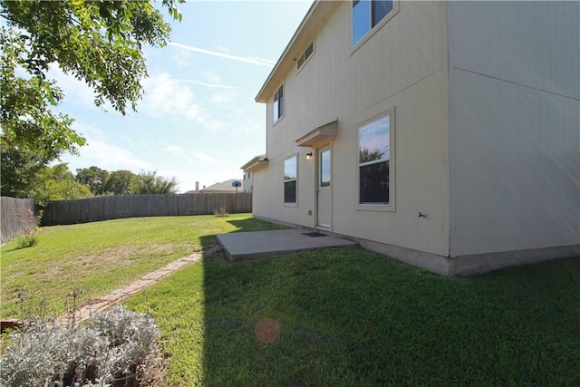 122 Bayliss St, Hutto, TX 78634 - view of yard featuring a fenced backyard and a patio area