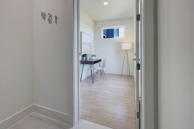 4300 Mansfield Dam Ct Unit 1231, Austin, TX 78734 - hallway with baseboards, an office area, and light wood-style floors