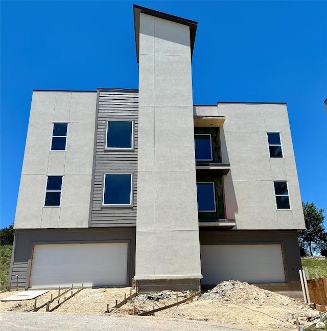 4300 Mansfield Dam Ct Unit 1231, Austin, TX 78734 - view of property with an attached garage