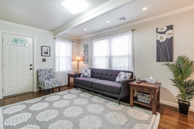 living area with visible vents, crown molding, beamed ceiling, recessed lighting, and wood finished floors