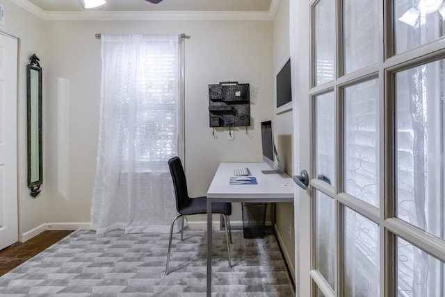 home office featuring crown molding and baseboards