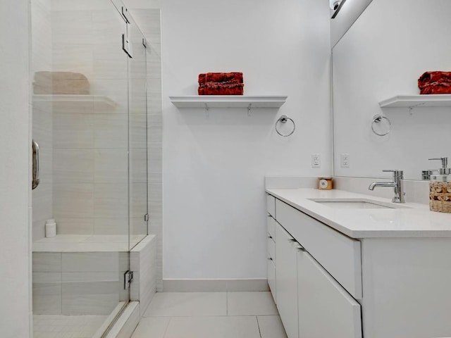 505 Tillery St Unit 6, Austin, TX 78702 - bathroom with vanity, a stall shower, tile patterned flooring, and baseboards