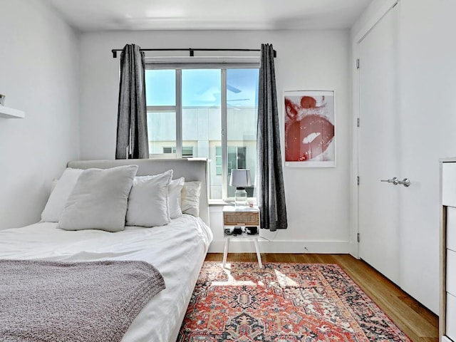 505 Tillery St Unit 6, Austin, TX 78702 - bedroom with wood finished floors and baseboards