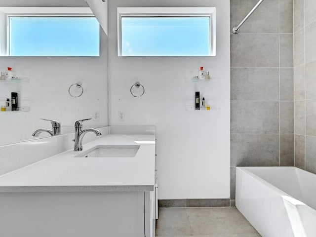 505 Tillery St Unit 6, Austin, TX 78702 - bathroom with vanity, tile patterned floors, and  shower combination