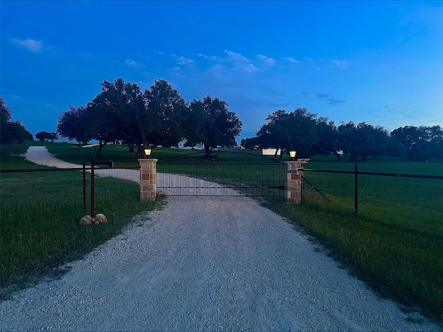 7993 W Fm 487, Florence, TX 76527 - view of dirt / gravel road with a gate and a gated entry