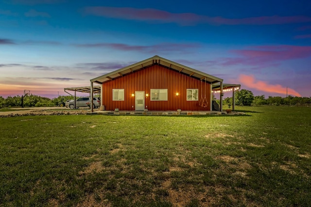 7993 W Fm 487, Florence, TX 76527 - view of side of property featuring board and batten siding, a carport, and a yard