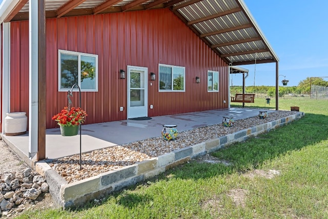 7993 W Fm 487, Florence, TX 76527 - rear view of house with a lawn and a patio area