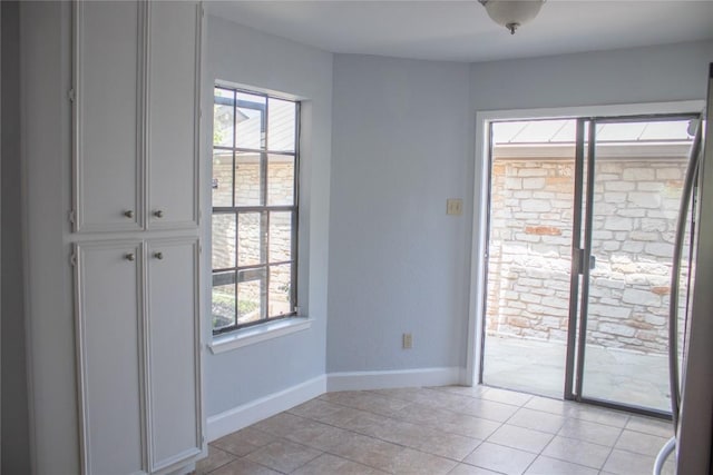 2201 Lakeway Blvd Unit 2, Lakeway, TX 78734 - unfurnished room with plenty of natural light and light tile patterned floors
