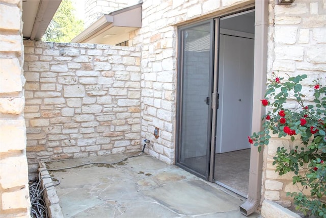 2201 Lakeway Blvd Unit 2, Lakeway, TX 78734 - view of exterior entry featuring stone siding