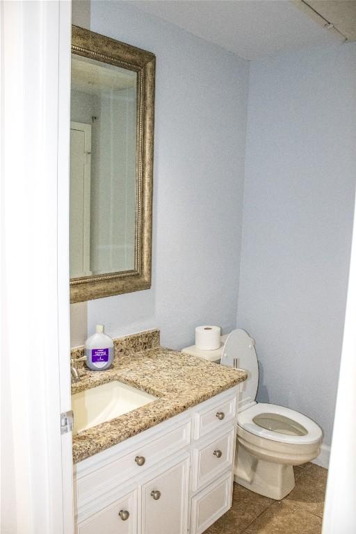 2201 Lakeway Blvd Unit 2, Lakeway, TX 78734 - half bath with vanity and tile patterned floors