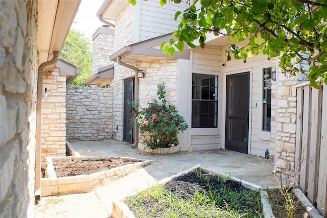 2201 Lakeway Blvd Unit 2, Lakeway, TX 78734 - doorway to property featuring stone siding