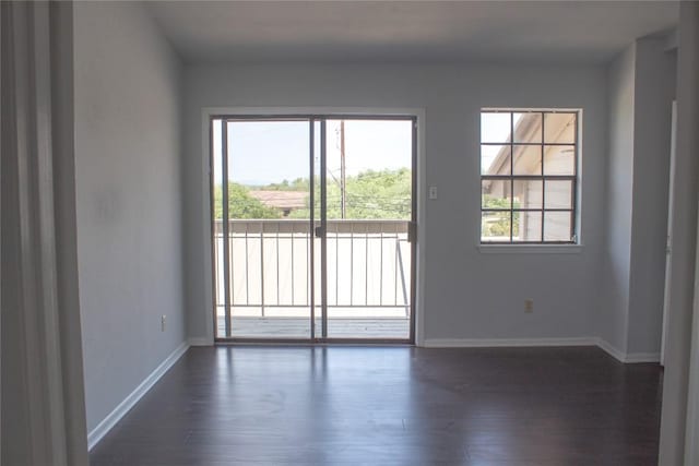 2201 Lakeway Blvd Unit 2, Lakeway, TX 78734 - empty room with baseboards and dark wood-style floors