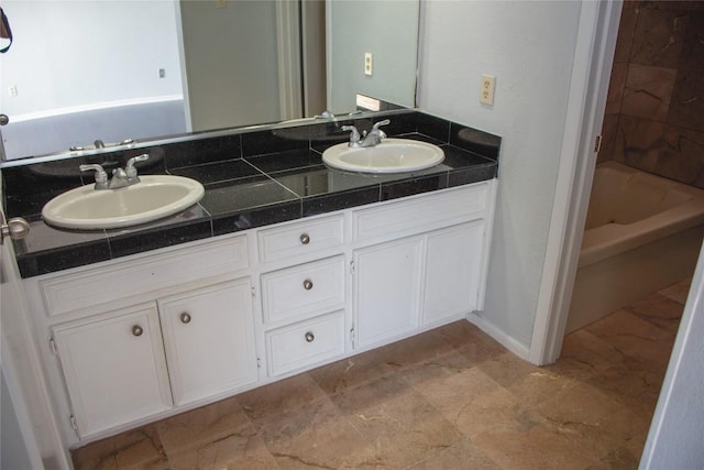 2201 Lakeway Blvd Unit 2, Lakeway, TX 78734 - full bathroom with double vanity and shower / bath combination
