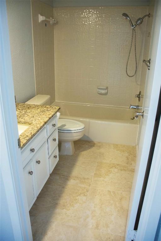 2201 Lakeway Blvd Unit 2, Lakeway, TX 78734 - full bathroom featuring vanity and bathing tub / shower combination