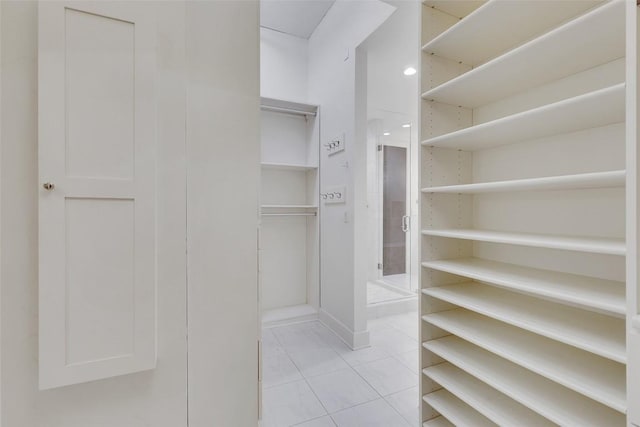 800 W 5th St Unit 1008, Austin, TX 78703 - spacious closet featuring light tile patterned floors