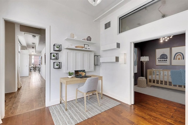 800 W 5th St Unit 1008, Austin, TX 78703 - office area with hardwood / wood-style floors and baseboards