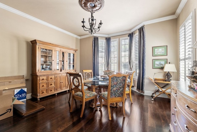 3708 Lajitas, Leander, TX 78641 - dining space featuring a chandelier, dark wood finished floors, and ornamental molding