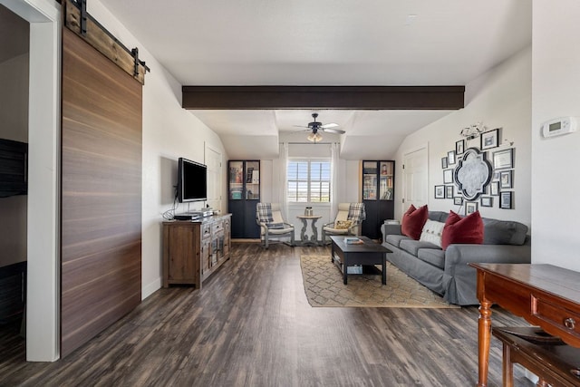 3708 Lajitas, Leander, TX 78641 - living area featuring a barn door, dark wood-style flooring, ceiling fan, and beamed ceiling