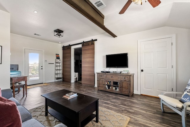 3708 Lajitas, Leander, TX 78641 - living area featuring a barn door, a ceiling fan, dark wood-style floors, and lofted ceiling